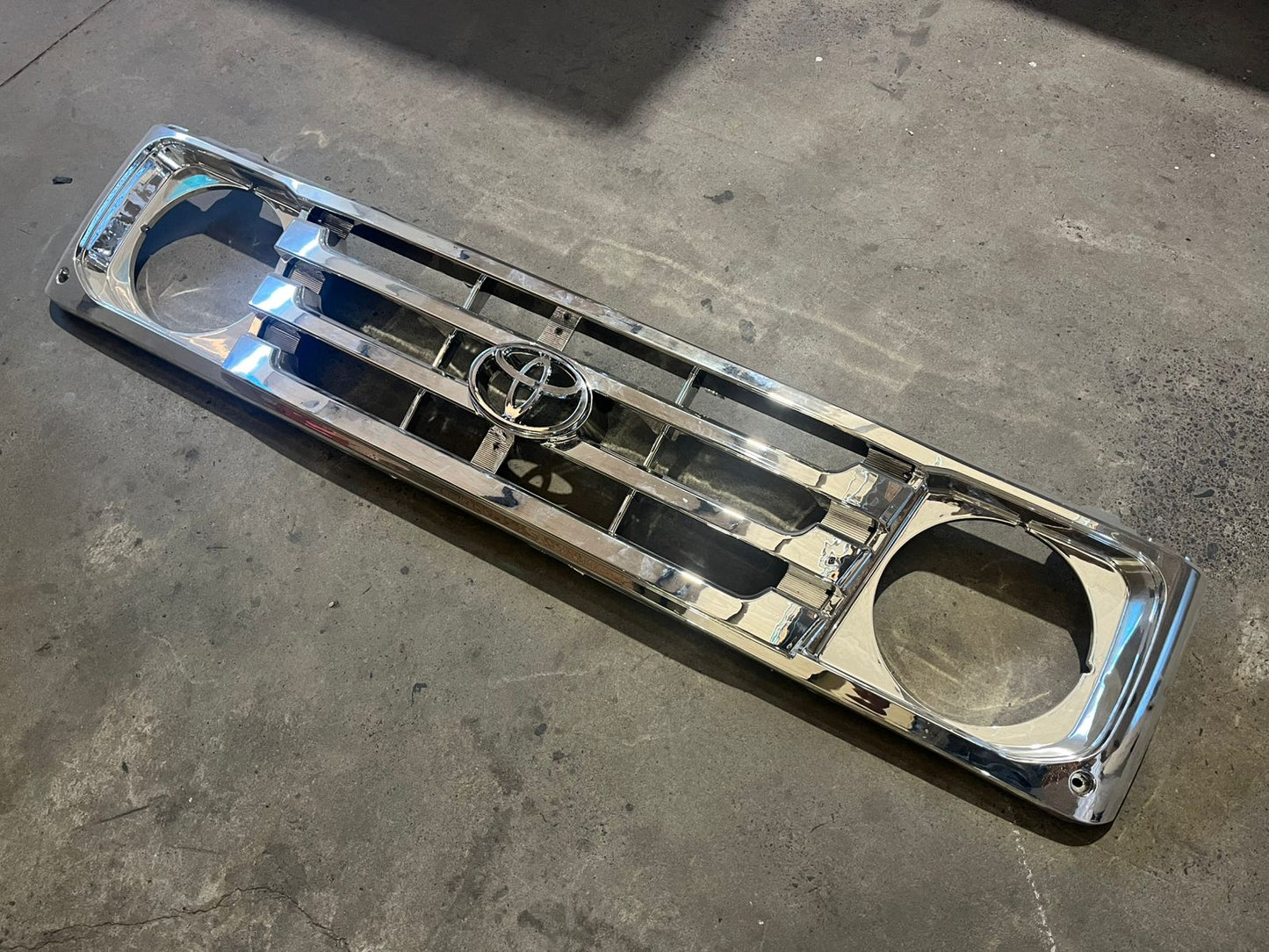 Toyota Land Cruiser 75 / 79 Series Chrome Grill Badge.