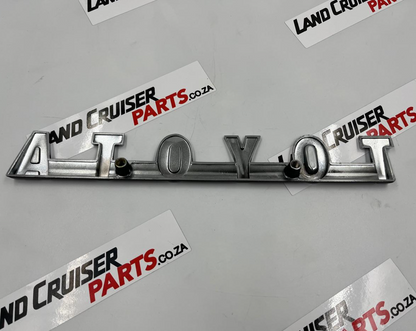 Toyota Land Cruiser FJ40 Grill Badge / Emblem OEM STEEL.